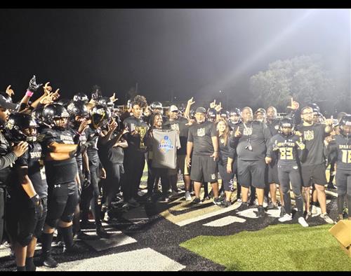Lakewood High JV football team on the field